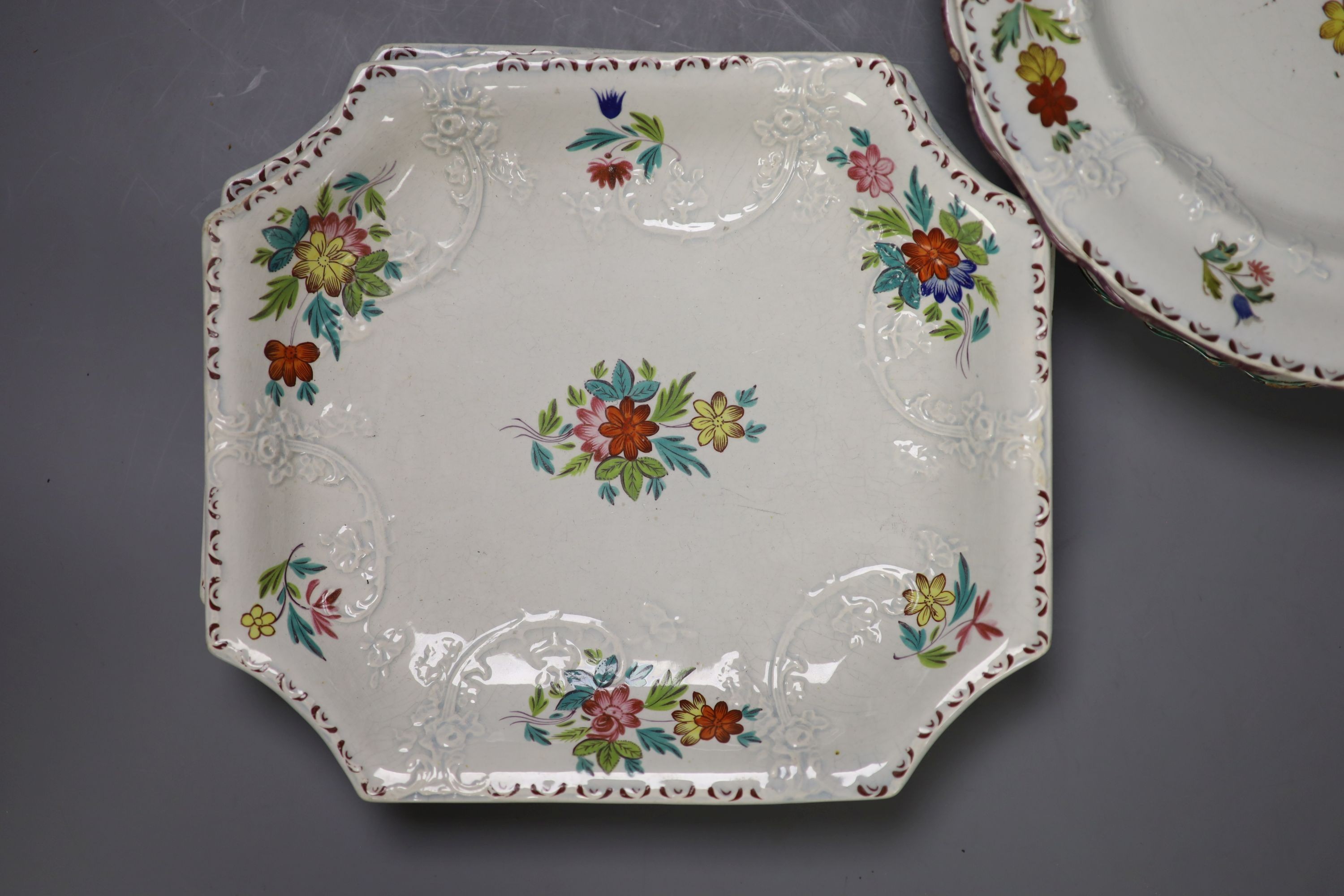 Four French faience plates and three Mason’s Cambrian Argil dishes and to early 19th century English porcelain ornithological dishes